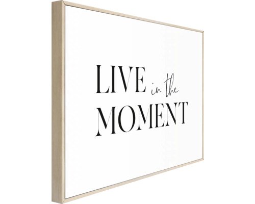 Wandbild mit dem Schriftzug Lebe den Moment