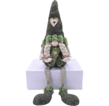 Gnome de Noël décoratif avec des jambes rayées et un cœur sur le bonnet