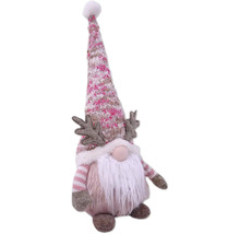 Gnome de Noël décoratif avec barbe et bonnet comme décoration festive