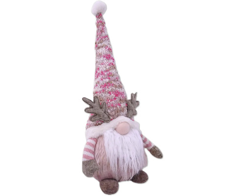 Gnome de Noël décoratif avec barbe et bonnet comme décoration festive