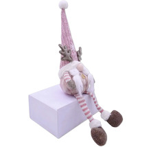 Nain de Noël décoratif avec bonnet, barbe et bois assis sur un cube