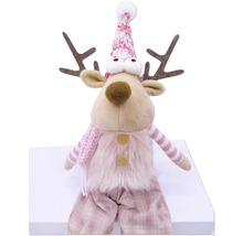 Renne décoratif avec bonnet et bois comme décoration de Noël
