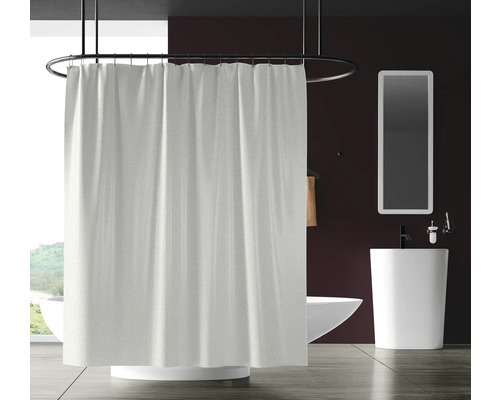 Salle de bain moderne avec baignoire, lavabo, miroir et rideau de douche