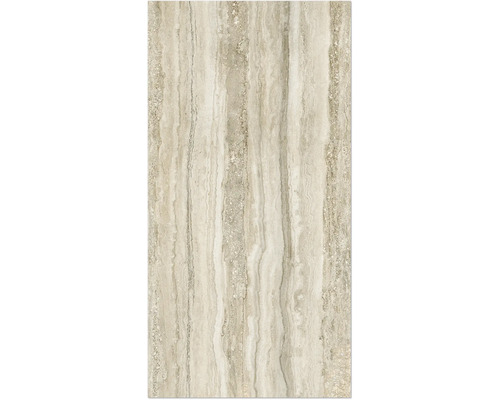 Carreau en travertin beige avec veinures naturelles.