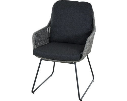 Fauteuil tressé avec pieds en métal et coussins en tissu