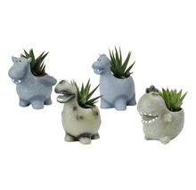 Quatre jardinières figurines animales avec des plantes succulentes