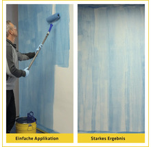 Mann streicht Wand mit Farbroller und Farbeimer