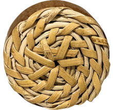 Dessous de plat rond tressé en fibres naturelles
