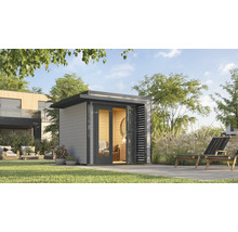 Jardin avec abri de jardin moderne, terrasse et mobilier de jardin.