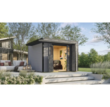 Abri de jardin moderne avec toit plat, portes coulissantes et coin salon extérieur sur terrasse surélevée