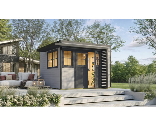 Abri de jardin weka Amberley 28 mm y compris plancher, fenêtre 350 x 353 cm gris-anthracite Scène de jardin avec une cabane de jardin moderne en bois avec toit plat et un coin salon en arrière-plan.