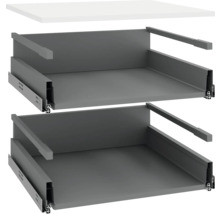 Deux tiroirs gris avec glissières et un plateau de table blanc.