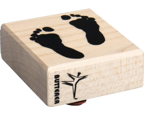 Holzstempel mit Fußabdruckmotiv und Butterer Logo.