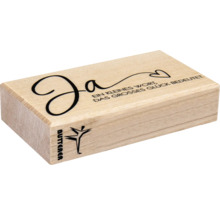 Holzstempel mit dem Schriftzug Ja und einem Herz