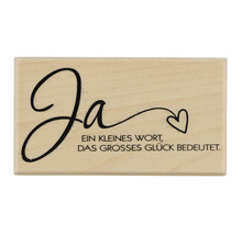 Holzstempel mit der Aufschrift Ja und einem Herz