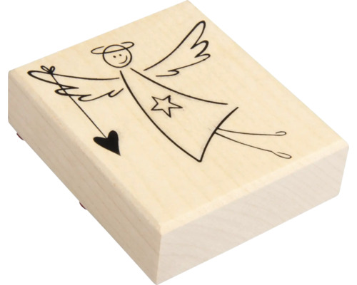 Stempel mit Engelmotiv auf Holzblock