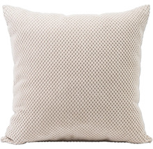 Coussin décoratif avec motif tricoté