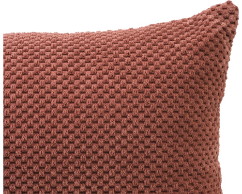 Coussin décoratif avec surface structurée