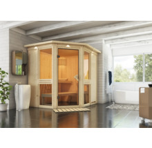 Sauna aus Holz mit Glastür in einem Badezimmer mit Waschbecken und Badewanne.