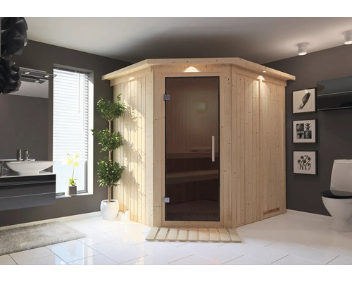 Elementsauna Karibu Petalit inkl. 9 kW Ofen u.integr.Steuerung mit Dachkranz und graphitfarbeneer Ganzglastüre Badezimmer mit Ecksauna aus Holz mit Glastür, Waschbecken und Toilette
