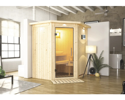 Sauna en bois avec porte en verre dans un espace de vie lumineux.