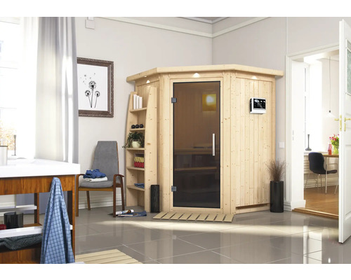 Image d'intérieur avec un sauna en bois avec porte en verre et éléments de commande
