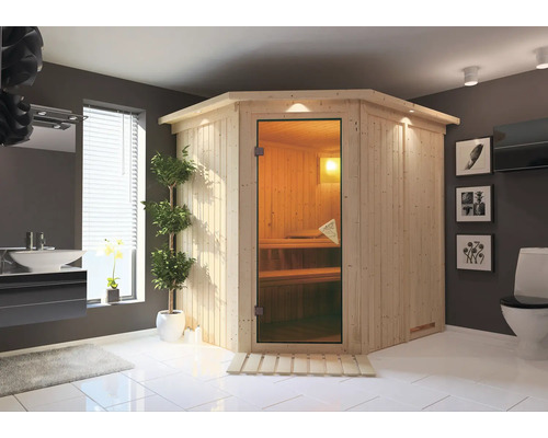 Sauna d'angle en bois avec porte en verre dans une salle de bains