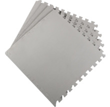 Plusieurs tapis puzzle gris