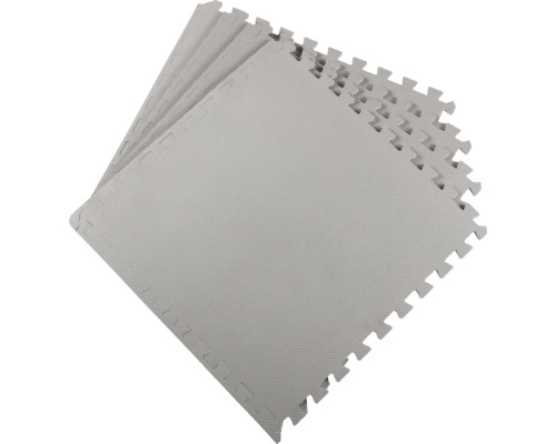 Plusieurs tapis puzzle gris