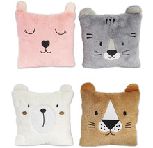 Vier dekorative Tierkissen für Kinder