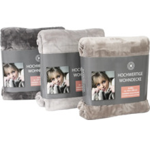 Trois plaids douillets, chacun emballé