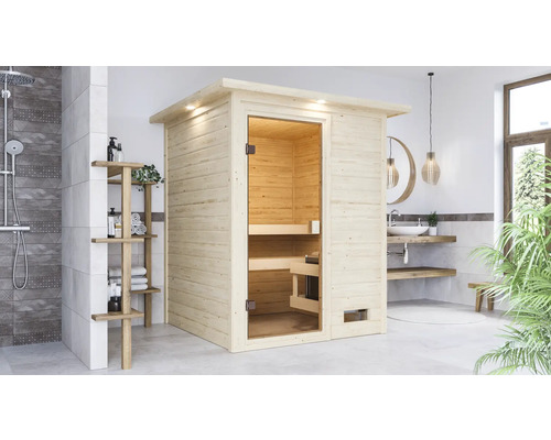 Sauna en bois massif Karibu Sandra avec poêle 9 kW et commande intégrée avec couronne et porte entièrement vitrée couleur bronze Image d'intérieur d'une salle de bains avec un sauna en bois
