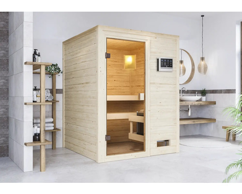 Sauna en bois massif Karibu Sandra avec poêle bio 9 kW et commande externe sans couronne avec porte entièrement vitrée couleur bronze Image d'intérieur d'une salle de bains avec un sauna en bois indépendant avec une porte en verre et un panneau de commande à l'extérieur