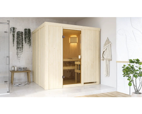 Sauna en bois avec porte en verre dans une salle de bain claire