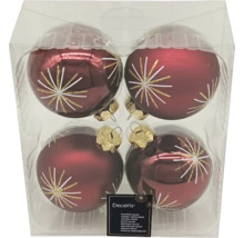 Quatre boules de Noël rouges en verre avec motif étoile dans un emballage transparent