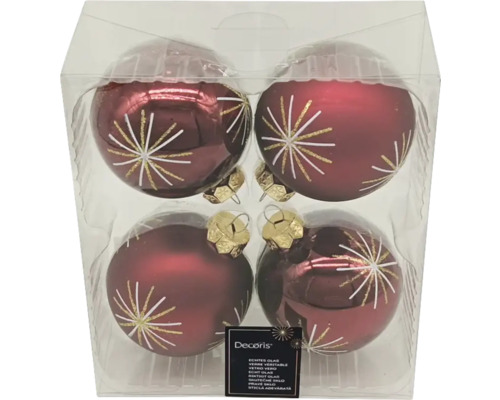 Quatre boules de Noël rouges en verre avec motif étoile dans un emballage transparent