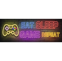 Enseigne néon avec console de jeu, manger, dormir, jouer, répéter sur un mur de briques