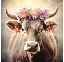 Portrait d'une vache avec des fleurs sur la tête
