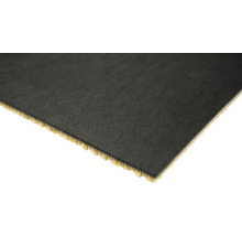 Gros plan d'un morceau de moquette avec une surface textile et un dessous en mousse