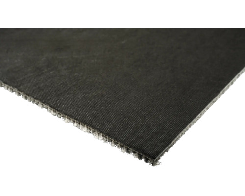 Gros plan d'une dalle de moquette noire.