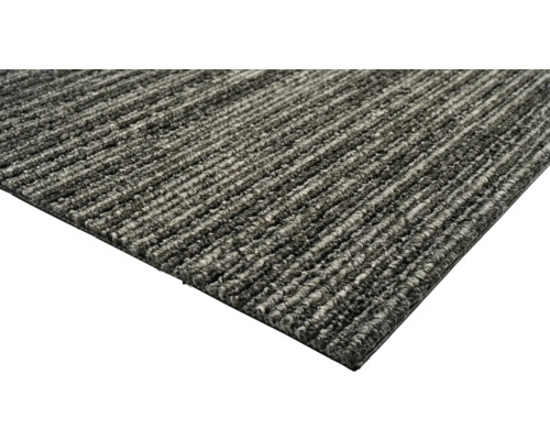 Vue détaillée d'un tapis rectangulaire avec une surface côtelée