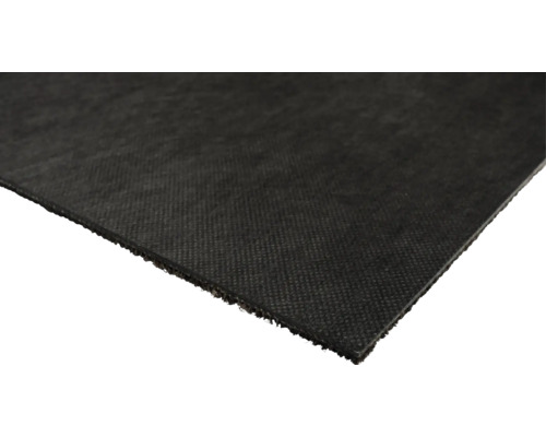 Gros plan d'un tapis de protection de chantier noir.