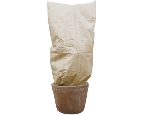 Sac de plantation dans un pot en terre cuite