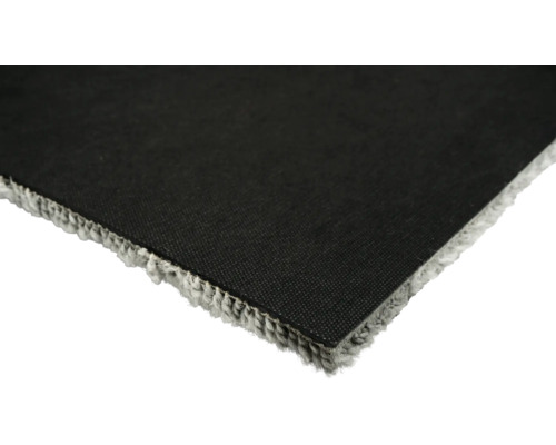 Vue détaillée d'un tapis avec envers textile et franges