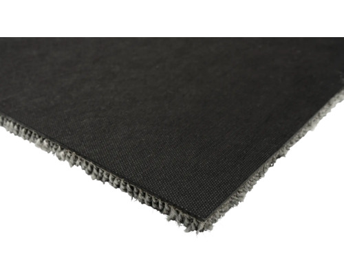 Gros plan d'un morceau de moquette noire.