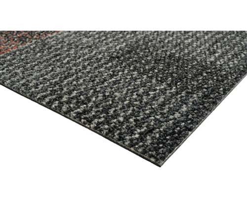 Gros plan d'une dalle de moquette.