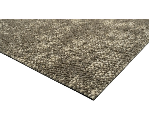 Vue détaillée d'un tapis à la texture chinée