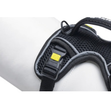 Vue détaillée d'un harnais pour chien noir avec fermeture jaune