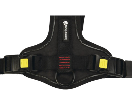 Vue détaillée d'un harnais pour chien noir avec le logo Bezztees et des boucles jaunes