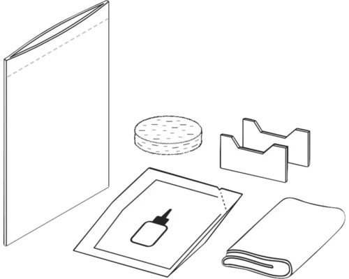 Inhalt einer Reparaturpackung mit Flicken, Kleber, Schleifpapier und Werkzeug